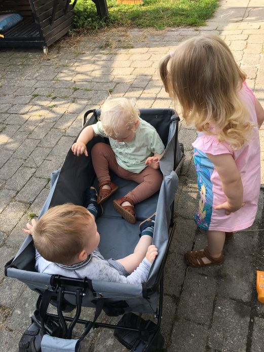 Two children playing with blocks